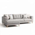 Gray fabric sectional sofa with wooden legs and decorative pillows approximately 230 x 90 x 85cm